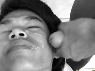 Asian Twink Gives Footjob